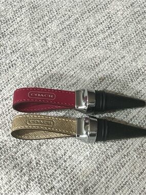 Duo COACH Red and Gold Leather Wine Stopper